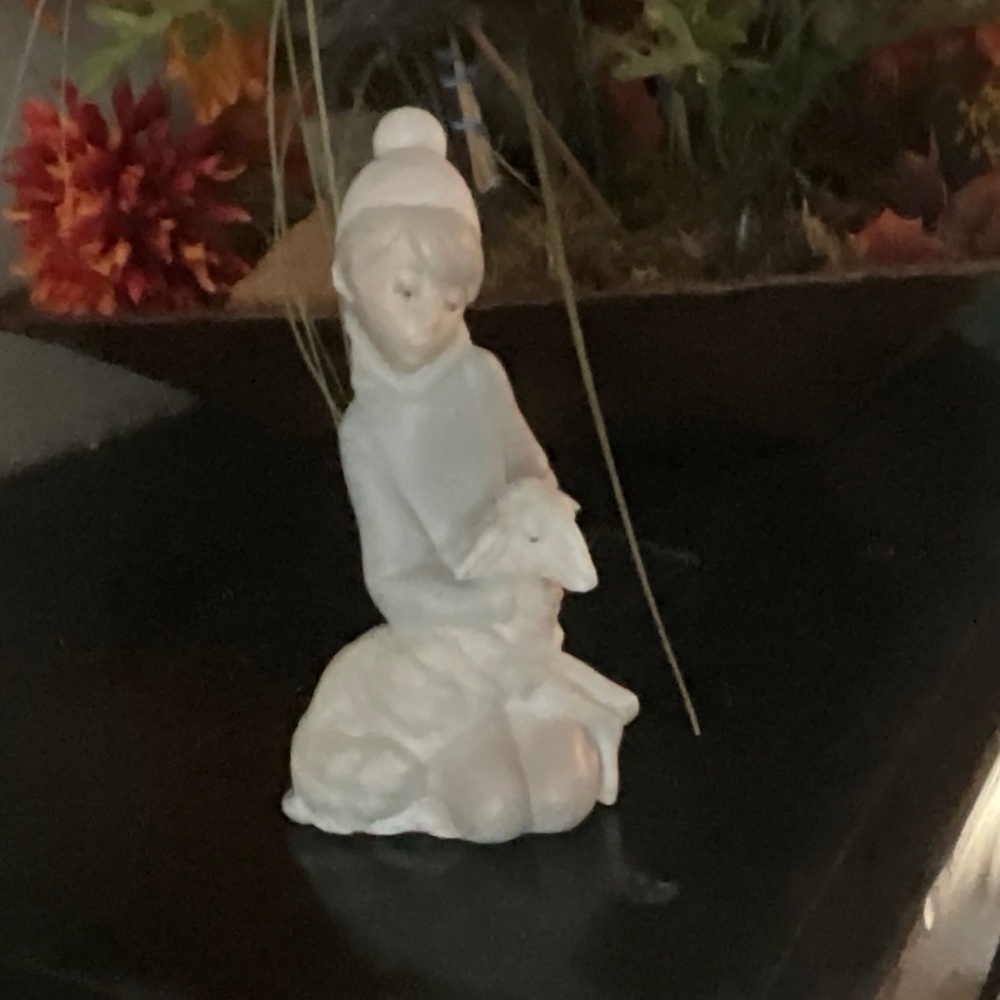 Lladro retired farm boy with lamb.  16-LR